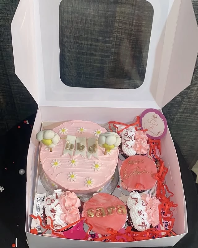 Birthday bento box for Sara with red theme and babydoll happy birthday design - Birthday Bento Boxes Karachi By Whisk And Sift